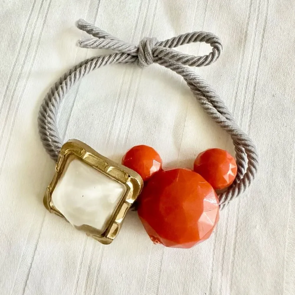Orange, white, and gray color Mickey Mouse hair tie